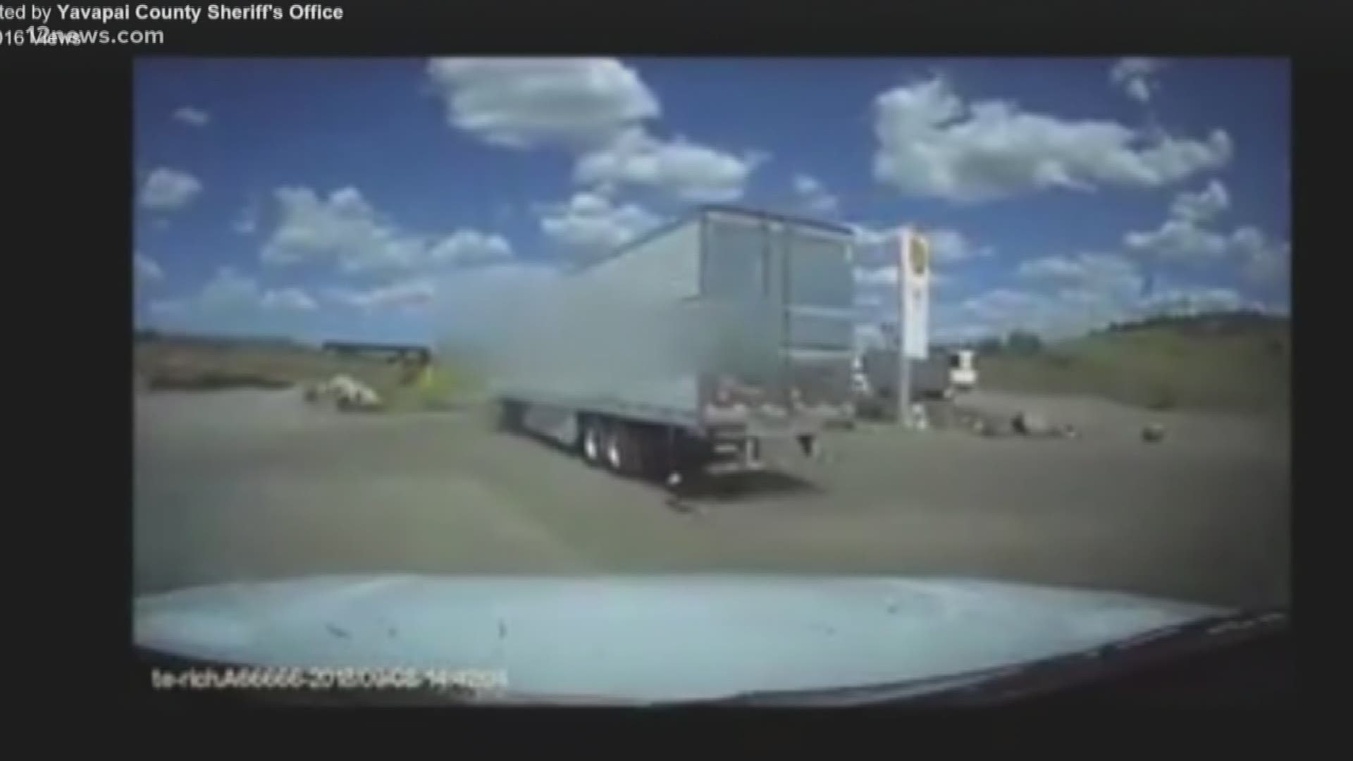 A volunteer with the Yavapai County Sheriff's Office happened to be in the right place at the right time to save a pit bull puppy from being dragged behind a semi-truck. His dash camera captured it all.