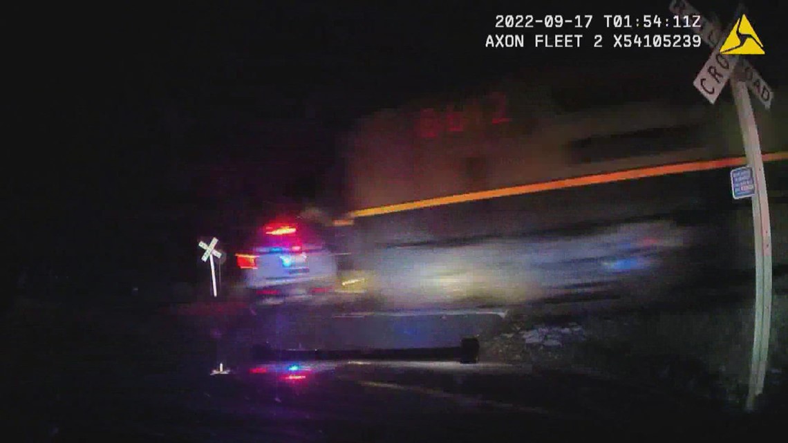 Train crashes into patrol car with suspect inside | khou.com