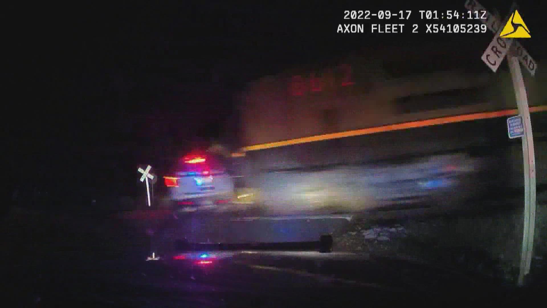 Editor's note: This video may be difficult to watch. Last week, a patrol car that was parked on train tracks with a detained woman inside was struck by a train.