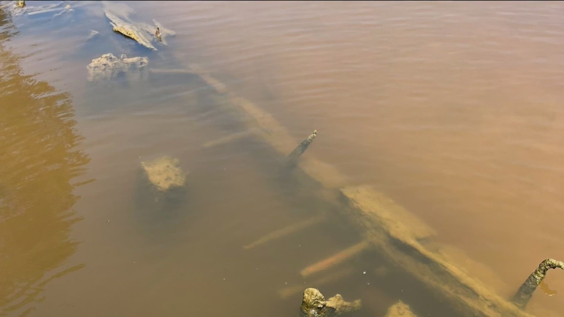 The mystery has been solved after the discovery of several large sunken ships in an East Texas river. The old wooden boats were found in the Neches River.