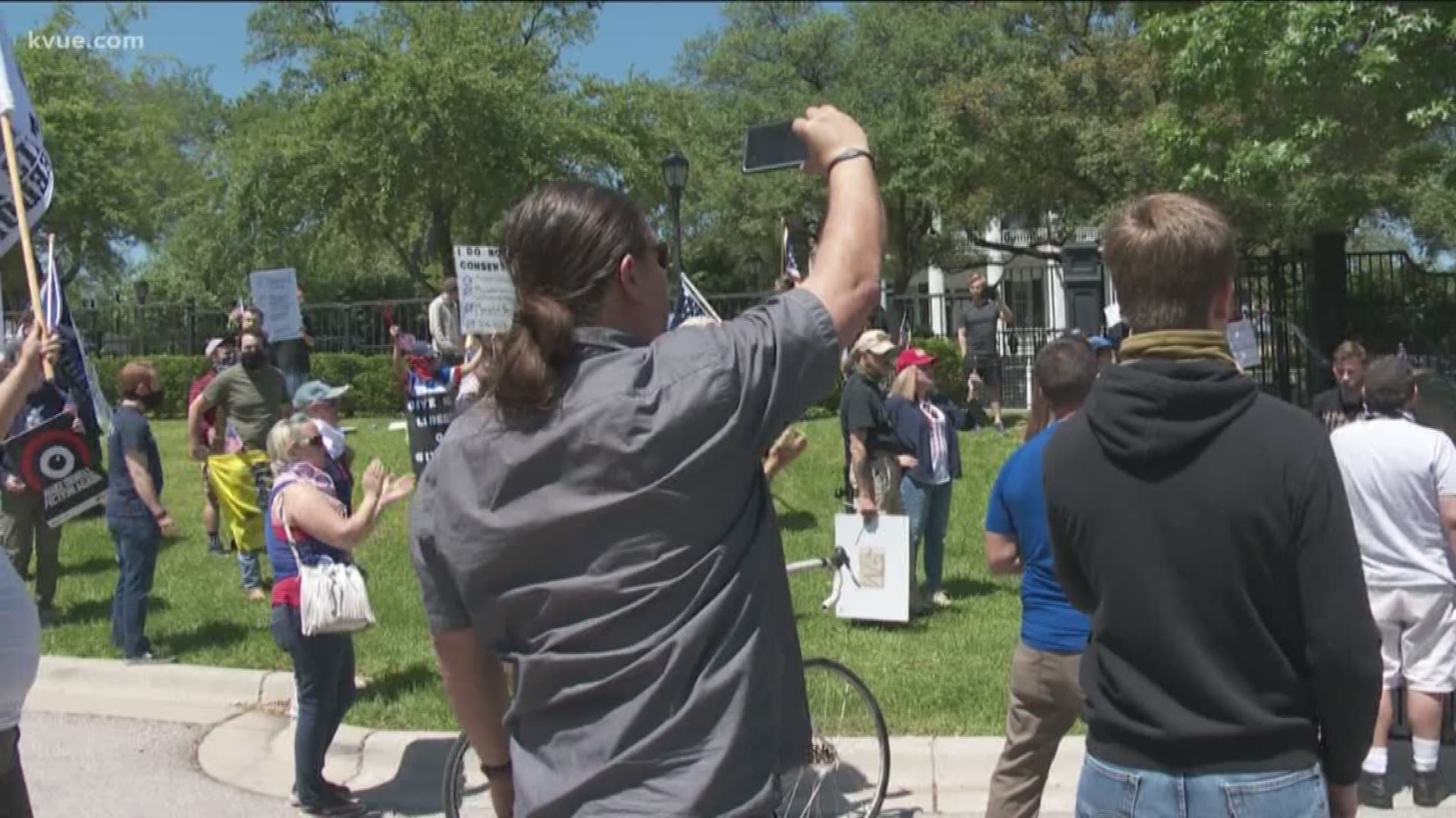 The protesters defied stay-at-home and social distancing orders, hoping to put pressure on Gov. Greg Abbott over when the state can reopen.