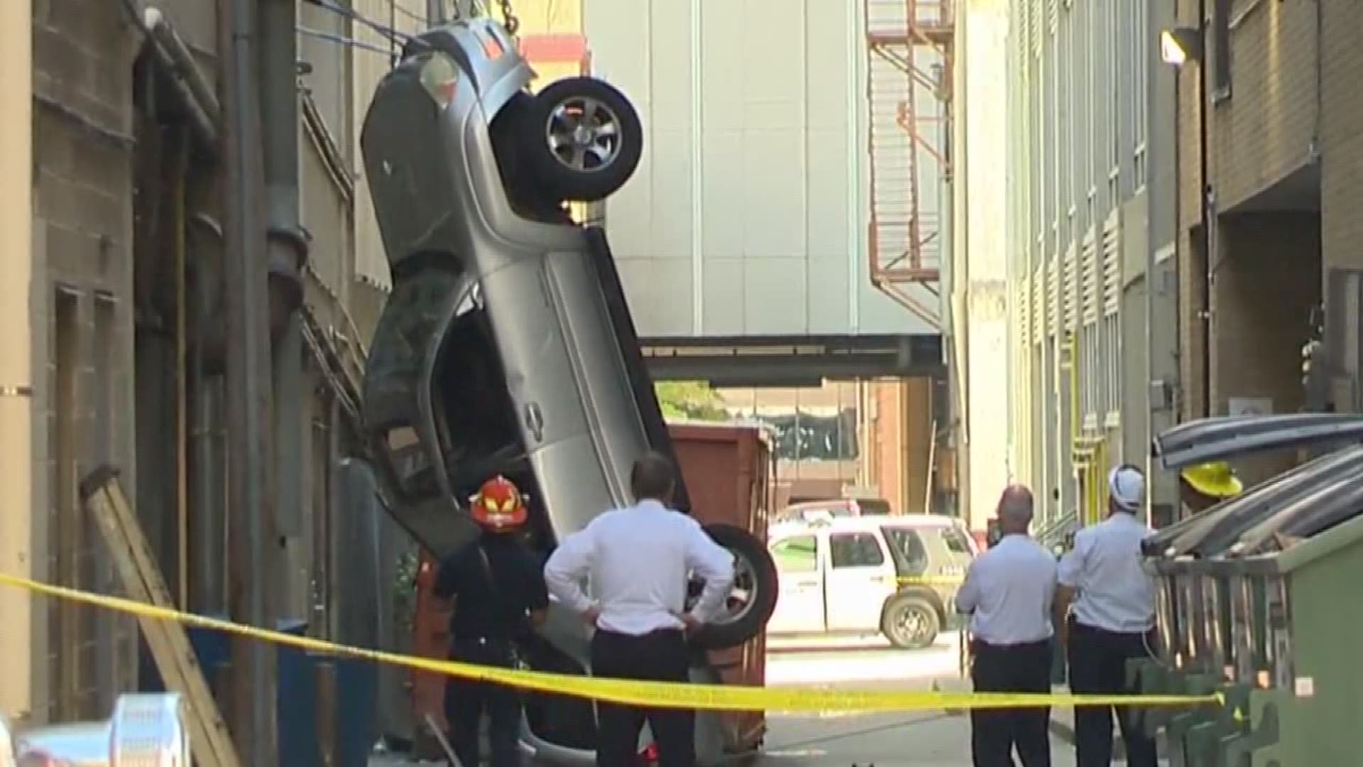 Woman injured after car goes off side of Austin parking garage | khou.com