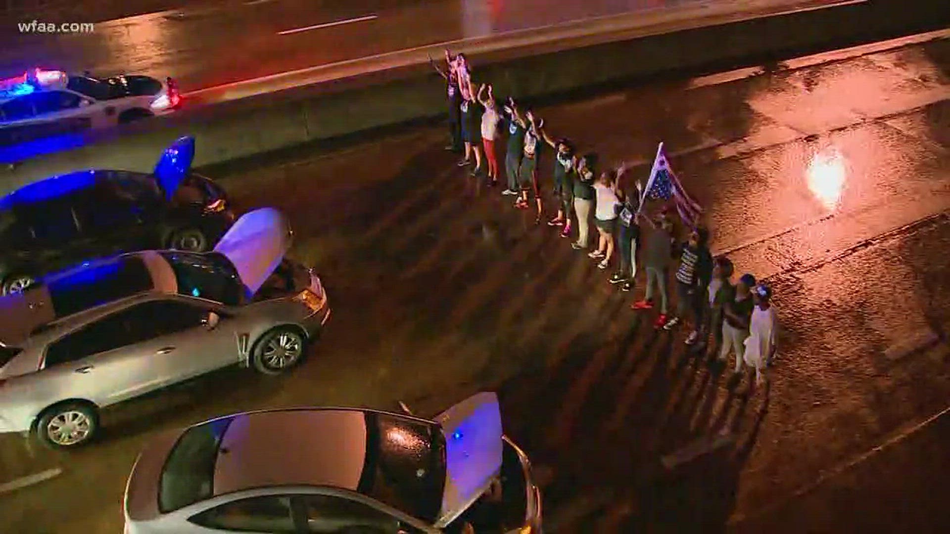 At one point Friday night, a group of protesters shut down I-30 near downtown Dallas.