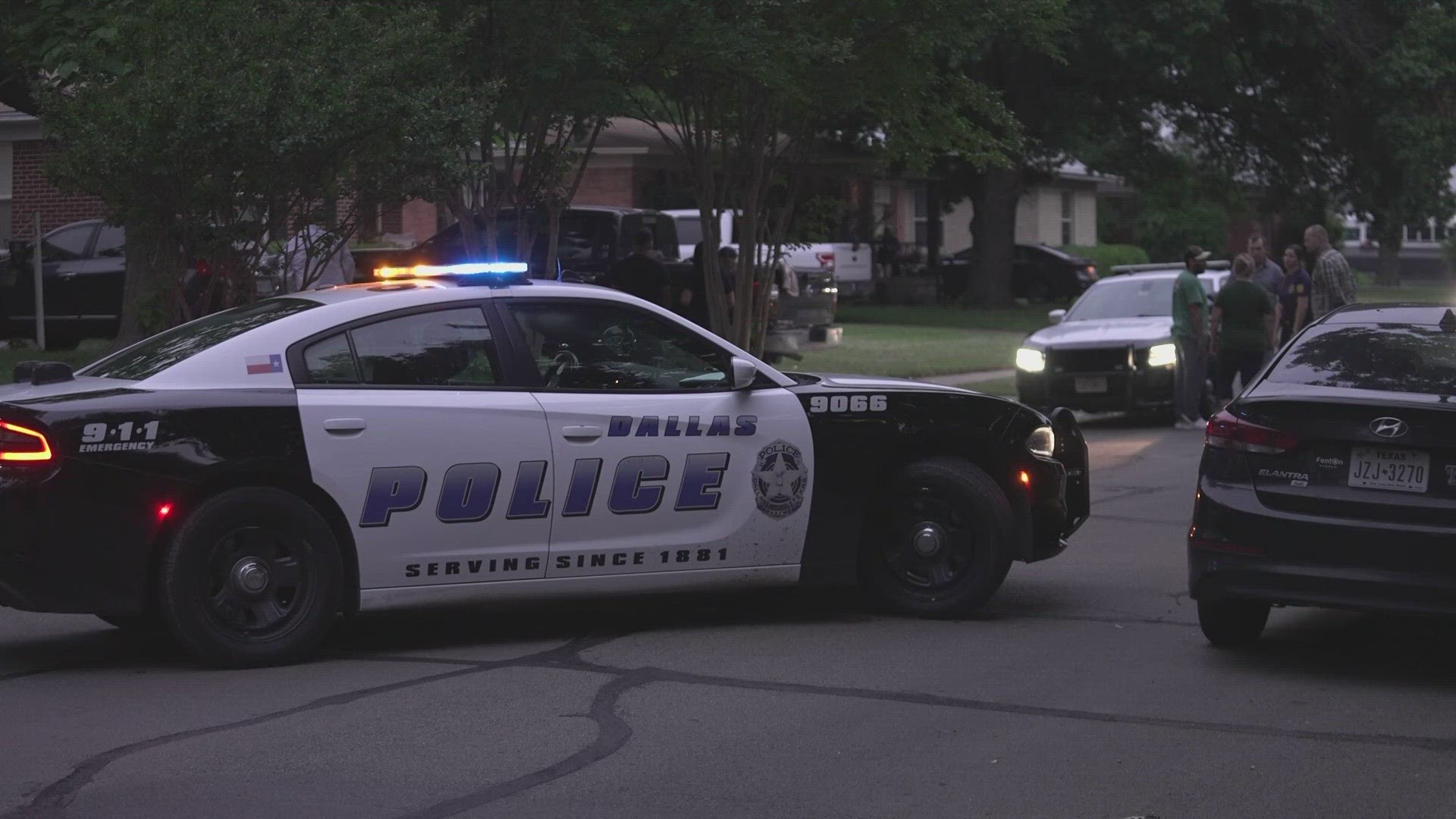 FBI agents and Dallas police officers arrived at the suspected shooter's home to investigate and interview family members.