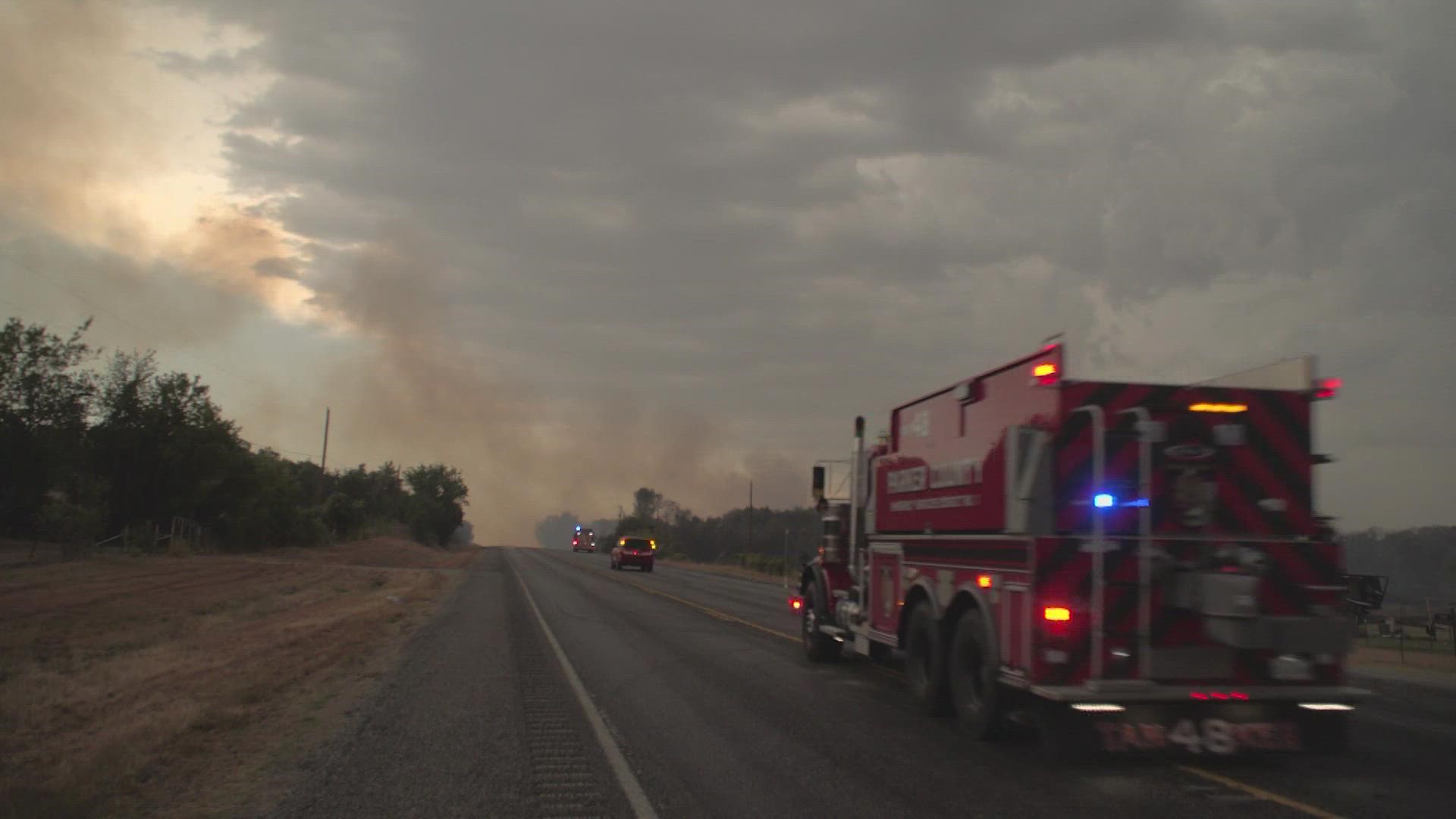 Firefighters welcome any rain but worry that lightning and wind could make conditions worse.