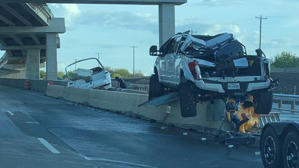 Boat launches off trailer after pickup truck crashes into barrier on I ...