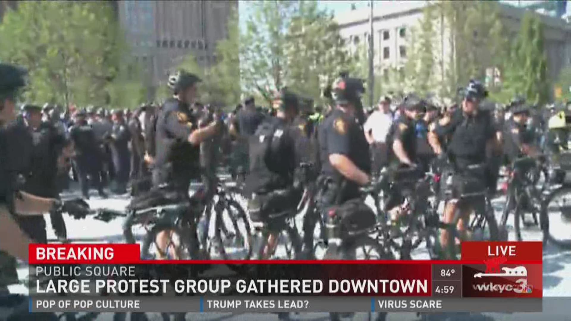 Protests spark at Public Square although the police presence remains greater than the demonstrators.