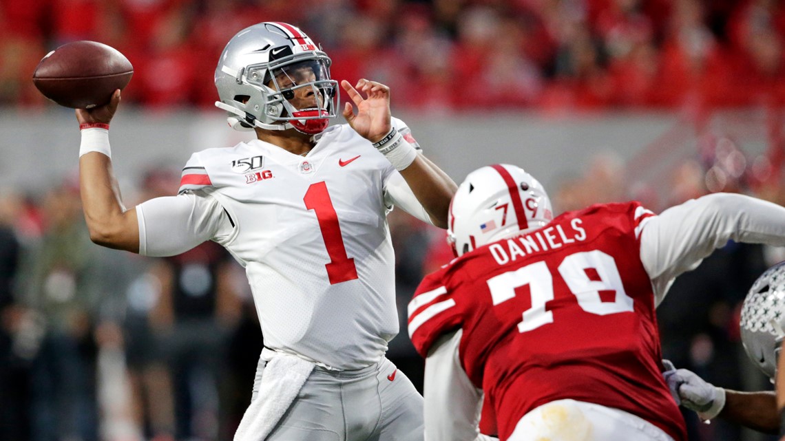 Ohio State's Justin Fields, Chase Young gaining Heisman ...