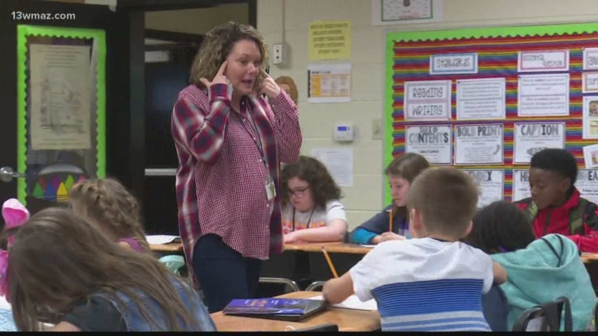 East Laurens students learn how to sign classmate's name