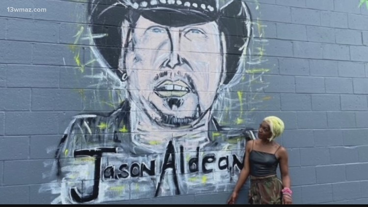 Georgia artist stands by her depiction of country music star Jason Aldean in mural