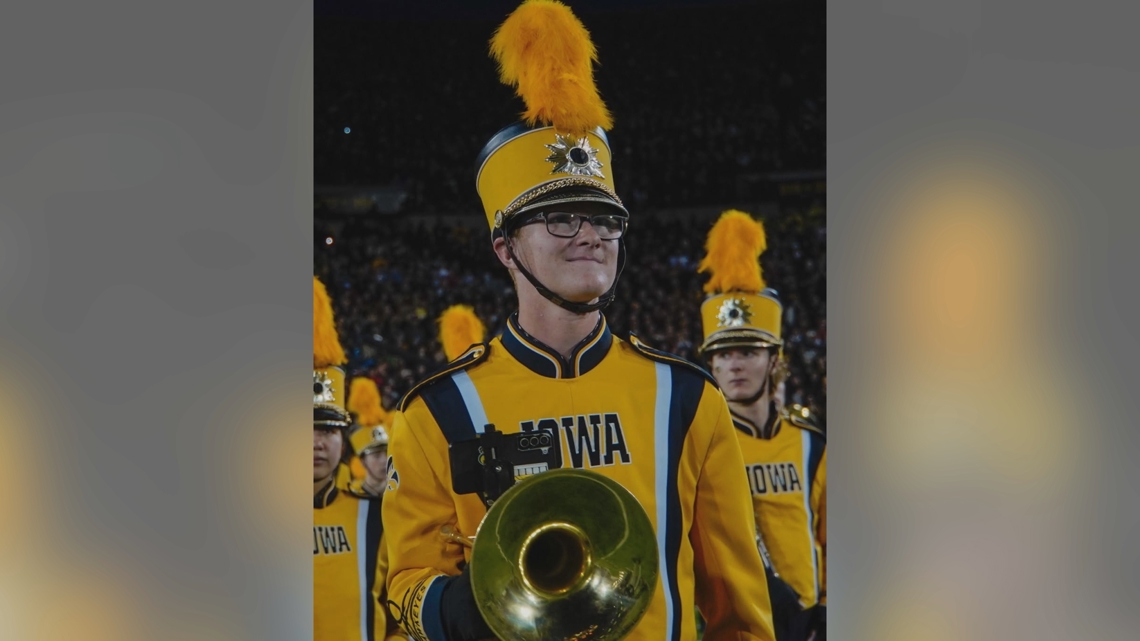 University of Iowa marching band member dies after collapsing at ...