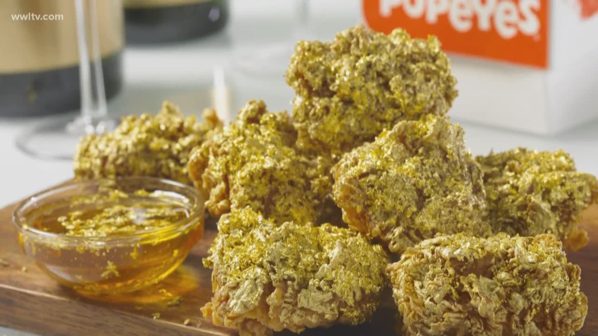 Popeyes is celebrating the opening of its 3,000 store by selling 24 karat gold boneless chicken wings. 