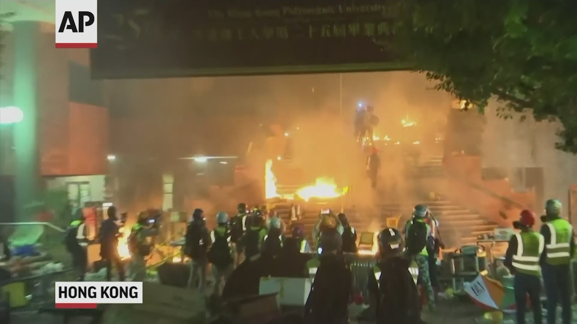 Police breached a Hong Kong university campus held by protesters early Monday after an all-night siege that included firing tear gas and water cannons.